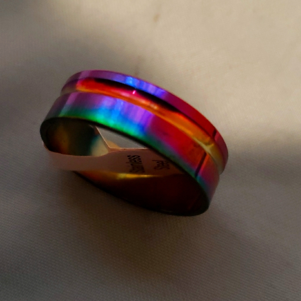 A brand new colorful man and women ring.